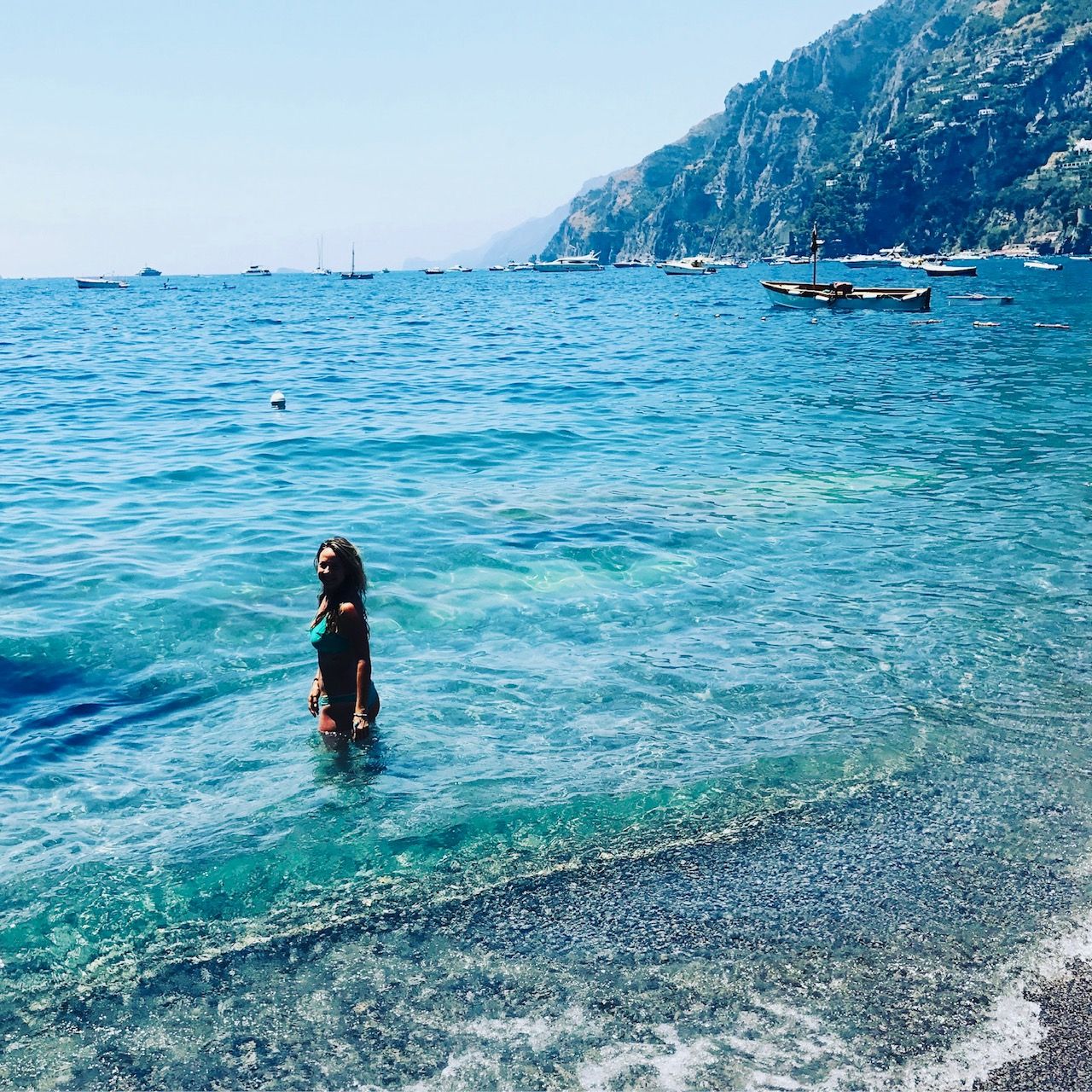 Summer in Positano, and the beautiful turquoise sea.